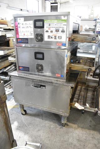 3 Stainless Steel Commercial Conveyor Pizza Ovens on Commercial Casters. Includes 2 CTX DZ33T Electric Powered and 1 Middleby Marshall PS638G Natural Gas Powered. 208 Volts, 3/1 Phase. 3 Times Your Bid! - Item #1183734