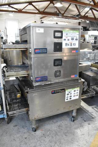 3 Stainless Steel Commercial Conveyor Pizza Ovens on Commercial Casters. Includes 2 CTX DZ33T Electric Powered and 1 Middleby Marshall PS638G Natural Gas Powered. 208 Volts, 3/1 Phase. 3 Times Your Bid! - Item #1183735