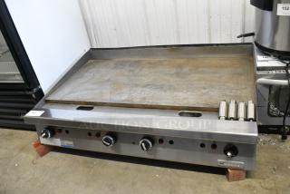 Garland Stainless Steel Commercial Countertop Natural Gas Powered Flat Top Griddle.