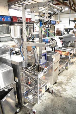 Lenis LMSTS-300L Metal Commercial Floor Style VFFS Sachet Packing Machine on Commercial Casters. 220 Volts.