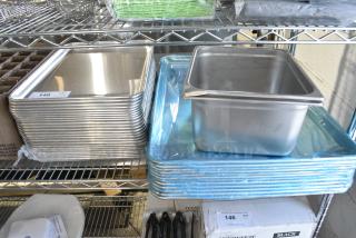 38 BRAND NEW SCRATCH AND DENT! Items Including Half Size Metal Baking Pans, Full Size Metal Baking Pans and 2 Half Size Drop In Bin. 38 Times Your Bid!
