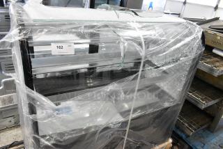 BRAND NEW SCRATCH AND DENT! Avantco 193BC48HCB 48" Curved Glass Black Refrigerated Bakery Display Case. 115 Volts, 1 Phase. See Pictures for Glass Damage.