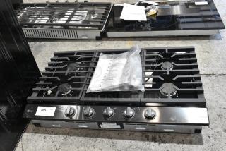 BRAND NEW SCRATCH AND DENT! LG 403KMTLOH745 Stainless Steel Commercial Gas Powered Drop In 5 Burner Range. 120 Volts, 1 Phase.