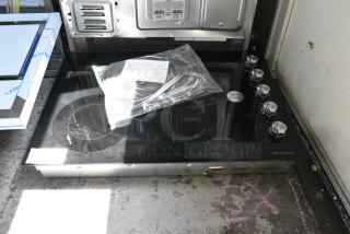 BRAND NEW SCRATCH AND DENT! KitchenAid KCES550HBL00 30" Black Electric Cooktop With 5 Elements And Knob Controls. 208 Volts, 3 Phase.