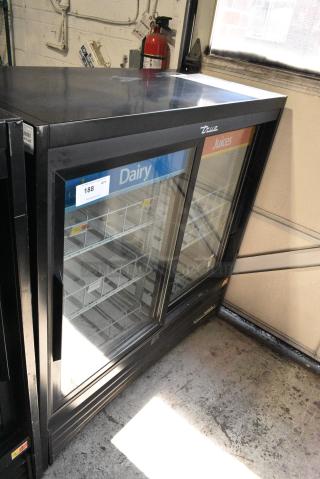 2018 True GDM-41SL-48-HC-LD Metal Commercial 2 Door Reach In Cooler Merchandiser w/ Poly Coated Racks. 115 Volts, 1 Phase.
