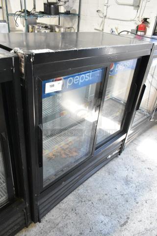 2019 True GDM-41SL-48-HC-LD Metal Commercial 2 Door Reach In Cooler Merchandiser w/ Poly Coated Racks. 115 Volts, 1 Phase.