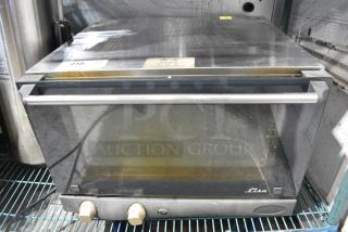 2017 Cadco XAF013 Lisa Stainless Steel Commercial Countertop Electric Powered Convection Oven w/ View Through Door and Metal Oven Rack. 120 Volts, 1 Phase.