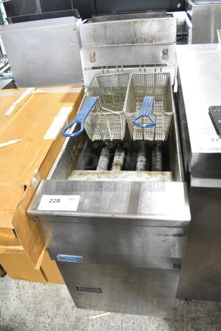 Pitco Frialator SG14 Stainless Steel Commercial Floor Style Natural Gas Powered Deep Fat Fryer w/ 2 Metal Fry Baskets. 110,000 BTU.