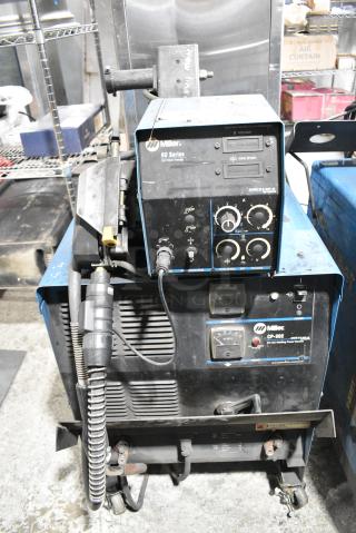 Miller CP-302 Metal Commercial MIG Welder Power Source w/ Miller 60 Series 24V Wire Feeder. 200/230/460 Volts, 3 Phase.