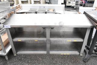Stainless Steel Table w/ 5 Under Shelves.