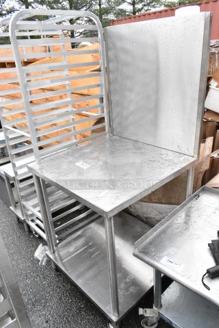 Stainless Steel Table w/ Back Splash and Under Shelf.