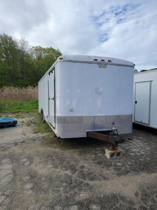 24' Continental Cargo Enclosed Tandem Axle Trailer! Comes with spare tire.*CONTENTS NOT INCLUDED* Equipped with overhead lighting, wood paneling interior, shelving, and electrical outlets! - This item is off site in Biddeford.