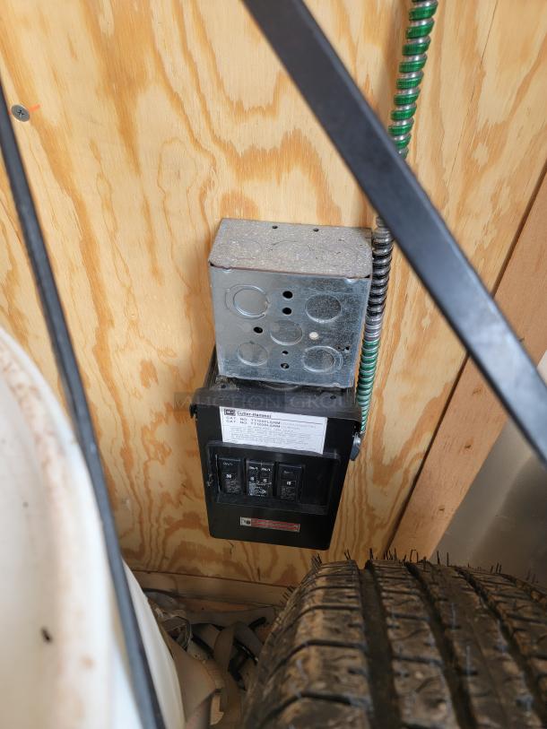 24' Continental Cargo Enclosed Tandem Axle Trailer! Comes with spare tire.*CONTENTS NOT INCLUDED* Equipped with overhead lighting, wood paneling interior, shelving, and electrical outlets! - This item is off site in Biddeford. - Image 8 of 15