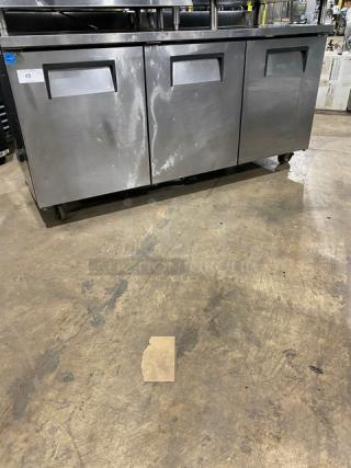 True Commercial Stainless Steel 3 Door Refrigerated 72" Worktop Table! Energy Star Certified! With Up Turned Back Splash! Model: TWT-72 SN: 7252355! 115V 1 Phase! On Casters!