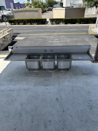 BRAND NEW! SCRATCH AND DENT! Regency - Stainless Steel Three Compartment Commercial Sink with 2 Drainboards. 17" x 17" x 12" Bowls.