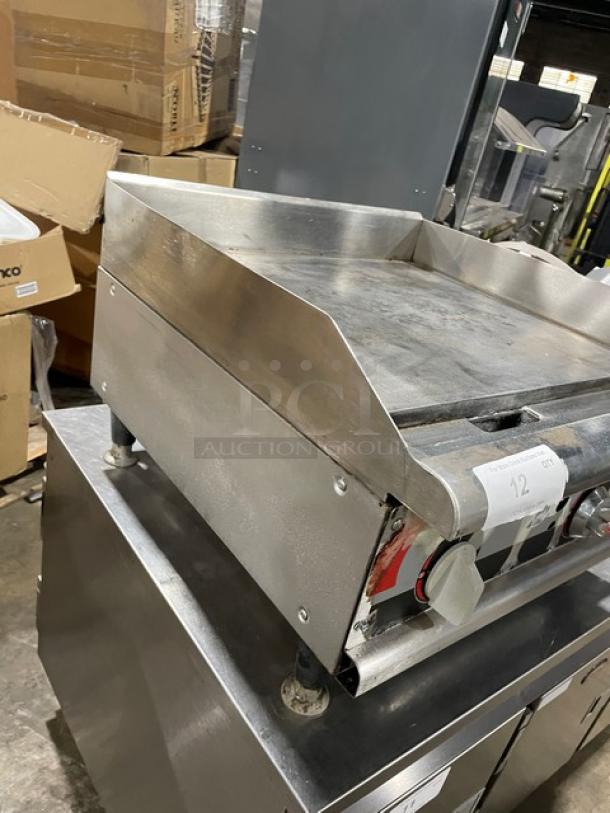 APW Wyott Champion Cook Series Commercial Stainless Steel Natural Gas Powered 24" Countertop Flat Griddle! With Snap-Action Thermostatic Controls & 1" Thick Smooth Polished Steel Griddle Plate! With Back & Side Splash! On Legs! - Image 3 of 7