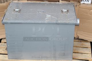 NEW!  Regency 50 lb. 25 GPM Grease Trap with 3" Non-Threaded Connections. Unit is scratched and dented. Top of unit has tape on it. Out of original packaging.