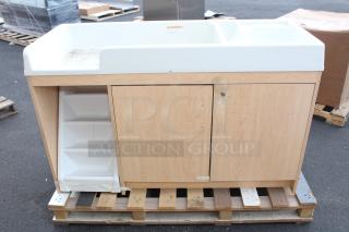 BRAND NEW SCRATCH-N-DENT! Tot Mate TM8543A.S2222 Maple Laminate Toddler Walkup Changing Table with Stairs and Right Side Sink - 59 1/2" x 23 1/2" x 37 1/2". There are two chips missing in the paneling on the left side of the unit