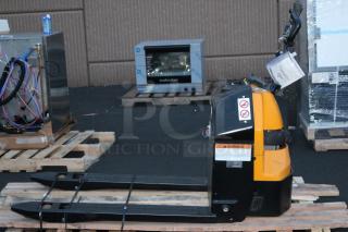 BRAND NEW SCRATCH-N-DENT! Big Joe D40 Electric Delivery Pallet Truck D40 - 4,000 lb. Capacity	, 24v. Front panel covering the wires is damaged.