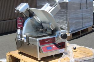 BRAND NEW! OUT OF ORIGINAL PACKAGING!! Estella SLAS13 13" Heavy-Duty Automatic Meat Slicer with Manual Use Option and Scale - 3/4 hp 120 Volts	4 Amps	1 Phase. S/N: 20BCAA0083