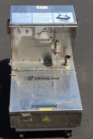 BRAND NEW, NEVER USED!! Out of Original Packaging. Fryclone 55 lb. Low-Profile Portable Fryer Oil Filter Machine with 2-Way Pump - 120V. Serial Number: 2406041054. Something sticky spilled on the unit.