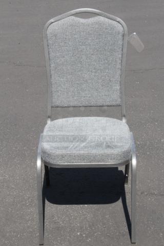 BRAND NEW!! (19) Lancaster Table & Seating 164BNQCRGR Gray Fabric Crown Back Stackable Banquet Chair with Silver Vein Frame, Seat Height = 19 Inches. Overall Dimensions = 17-3/8x21-11/16x37-3/4. 19x Your Bid