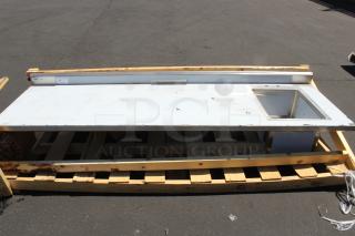 BRAND NEW SCRATCH-N-DENT! Regency 600ST3096R 30" x 96" 16 Gauge Stainless Steel Work Table with Sink - Sink on Right. Legs not included.