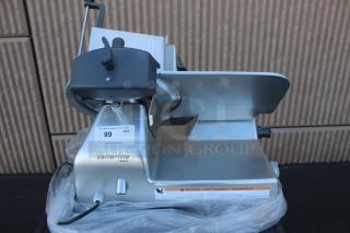 BRAND NEW, NEVER USED! Centerline by Hobart EDGE12 12" Manual Meat Slicer - 1/2 hp 120 Volts,	4 Amps,	1 Phase,	480 Watts. Serial Number: EN-1110219. The top of the selector is damaged but fully functional.