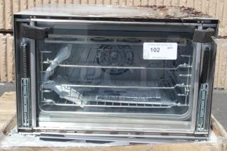 BRAND NEW SCRATCH-N-DENT! Vollrath CO4-120HS Half Size Countertop Convection Oven - 120V. Serial Number: 0065-02551947-015. Glass is broken. Black stuff is plastic factory wrapping, easily removed, will not leave any lasting marks. - Item #1191529