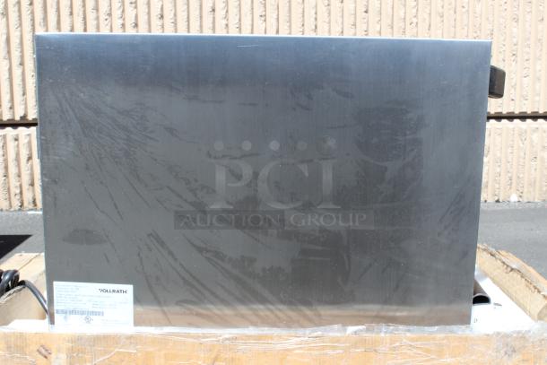 Vollrath commercial food warmer, stainless steel, new condition, model details label visible with specifications.