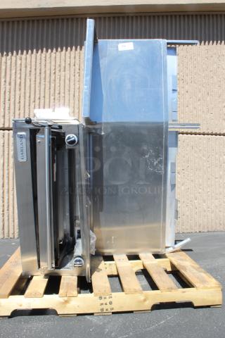 BRAND NEW! Garland GIR60 Natural Gas Range-Mount Infra-Red Salamander Broiler for G60 Series Ranges - 40,000 BTU. Serial Number: 2409100101188. Out of Original Packaging. Unit has easily some denting and fixed bending. Salamander Broiler is still in great condition and the mount appears structurally viable once it's straightened and mounted to an oven. - Item #1191531