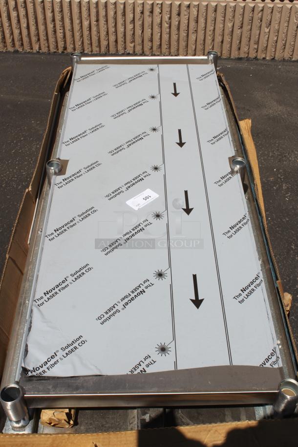 Rectangular metal panel branded "Novacel" for LASER Co., with protective covering, in excellent condition, boxed.