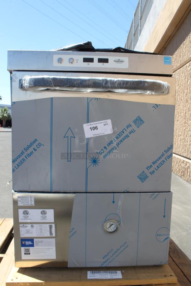 Commercial dishwasher on pallet, wrapped in protective film. Mainstreet brand with control panel, gauge, and labels. New condition.
