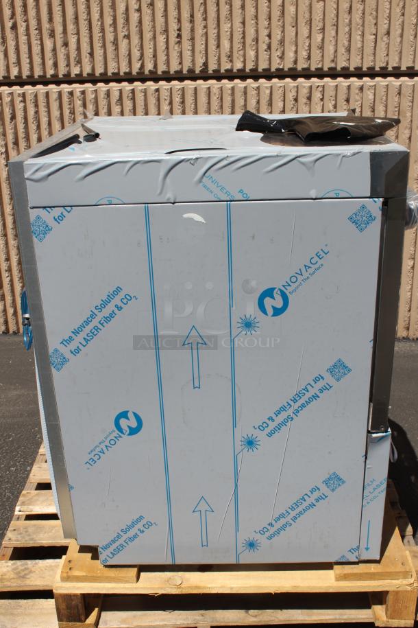 Metallic cabinet wrapped in Novacel protective film, featuring laser and CO2 solution markings, on a wooden pallet, in new condition.