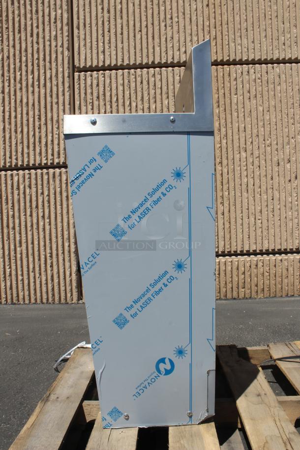Stainless steel panel with protective film by Novacel, designed for laser applications. New condition on wooden pallet.