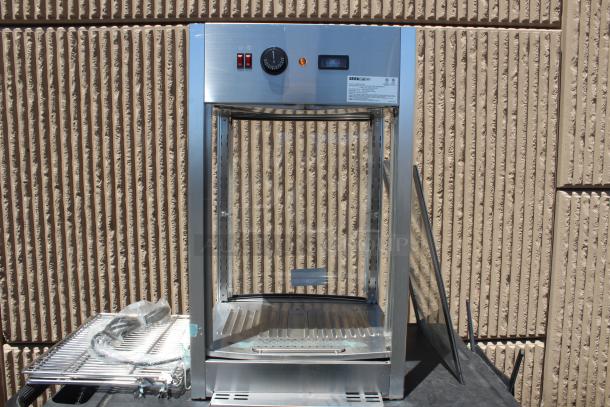 Stainless steel Serv-Ware commercial food warmer, new condition, featuring a temperature dial, power switches, and visible wiring.
