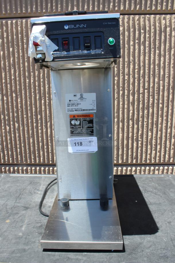 Bunn CW Series coffee maker with switches, ready light, and labeling. Model PN: 23001.0017. Stainless steel body, good condition.