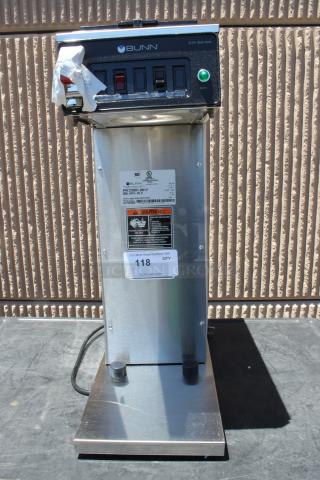 Bunn CW Series coffee maker with switches, ready light, and labeling. Model PN: 23001.0017. Stainless steel body, good condition.
