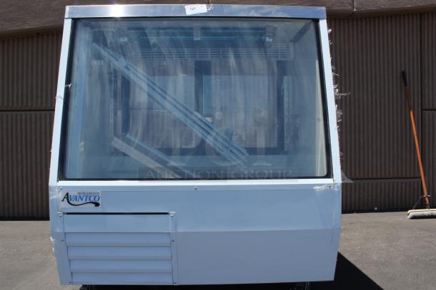 Avantco refrigerated display case, white, glass panels, intact condition, with visible model label and number tag 121.