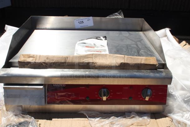 Vulcan commercial griddle, stainless steel, dual temperature controls, new condition, includes user manual.