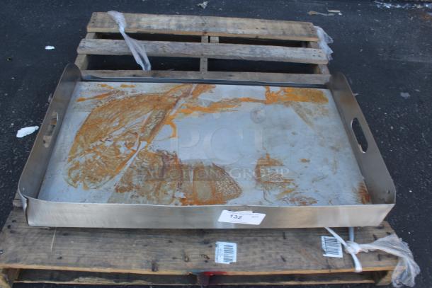 Large stainless steel tray with handles, heavily rusted, on wooden pallet. Label reads "132". Used condition.
