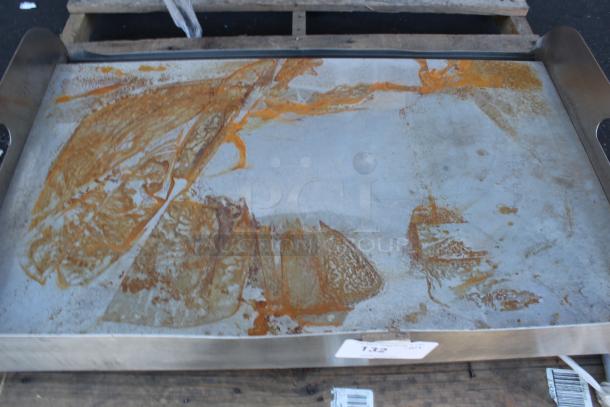 Large stainless steel tray with orange rust stains, used condition. Numbered label 132 attached.