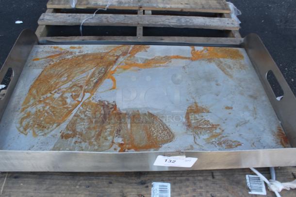 Large metal baking tray with rust marks, fair condition. Features two side handles. Label reads "132".