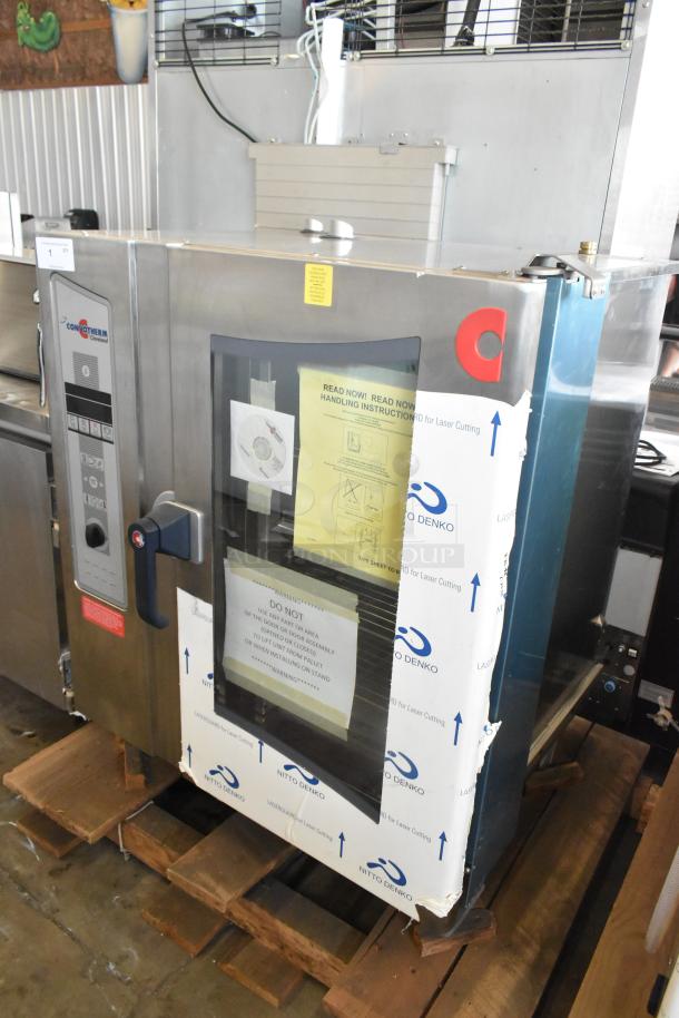 Brand new 2023 Cleveland OEB-10.10 stainless steel electric combi oven, 440/480V, 3 Phase, with handling instructions visible.