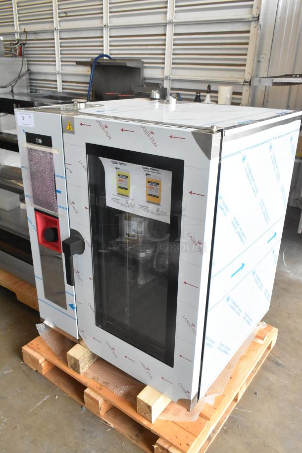Brand new Blodgett AETG101R stainless steel commercial combi convection oven, natural gas, with protective film and minor scratches.