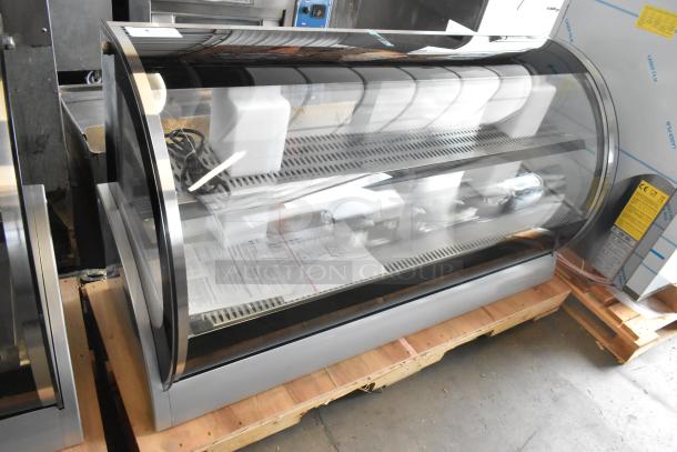 Brand new Vollrath RDE8160 60" curved glass refrigerated display cabinet. 120 Volts, 1 phase, scratch and dent condition.