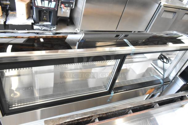 Brand new Vollrath RDE8160 60" countertop curved glass refrigerated display cabinet. 120V, 1 phase, scratch and dent condition.