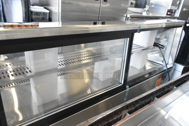 BRAND NEW Vollrath RDE8160 60" countertop refrigerated display cabinet with curved glass, 120V, 1 phase, slight scratches.