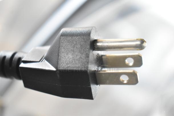 Close-up of a power plug for the Vollrath RDE8160 60" refrigerated display cabinet, 120V, 1 Phase.