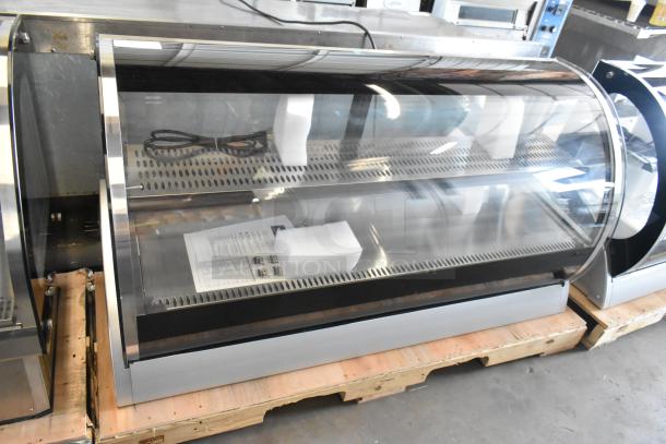 Brand new Vollrath RDE8160 60" countertop curved glass refrigerated display cabinet, 120V, 1 phase, slight dent.